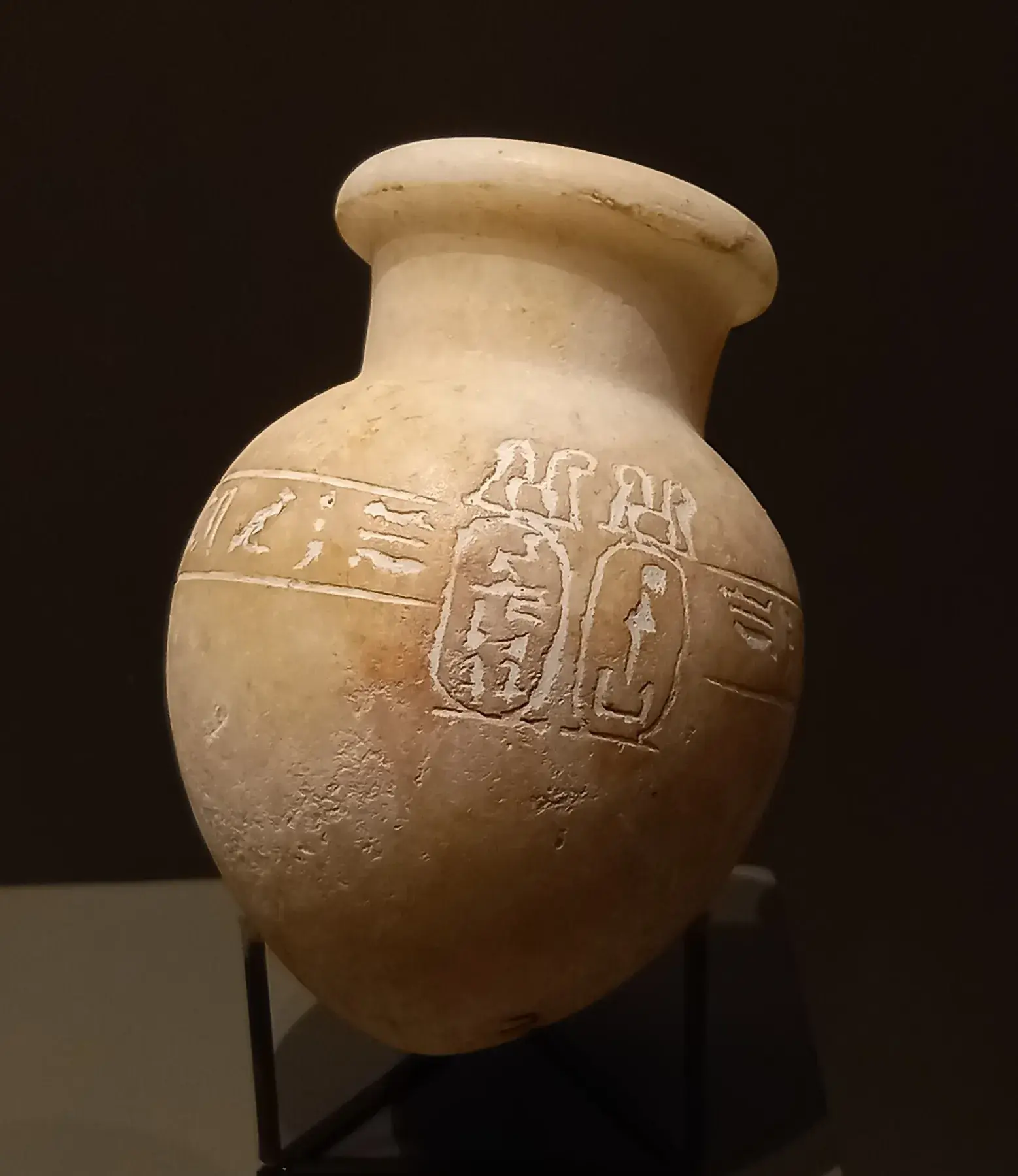 An ancient Egyptian alabaster perfume flask